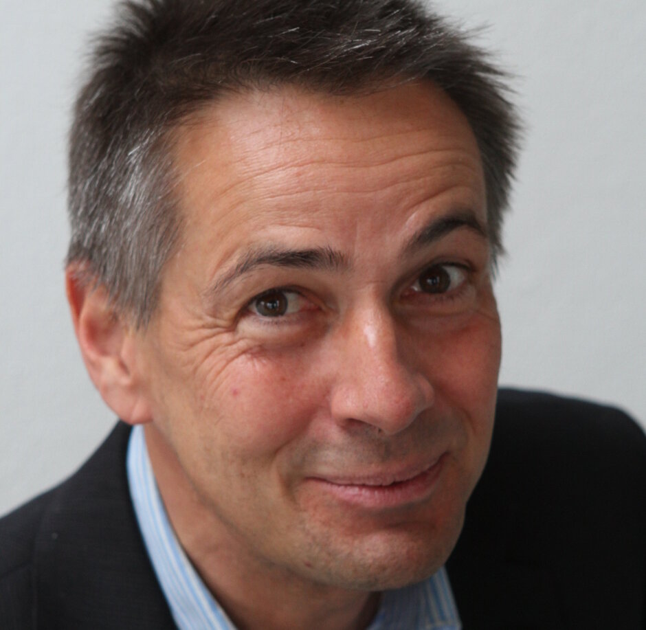 Porträtfoto eines Mannes.