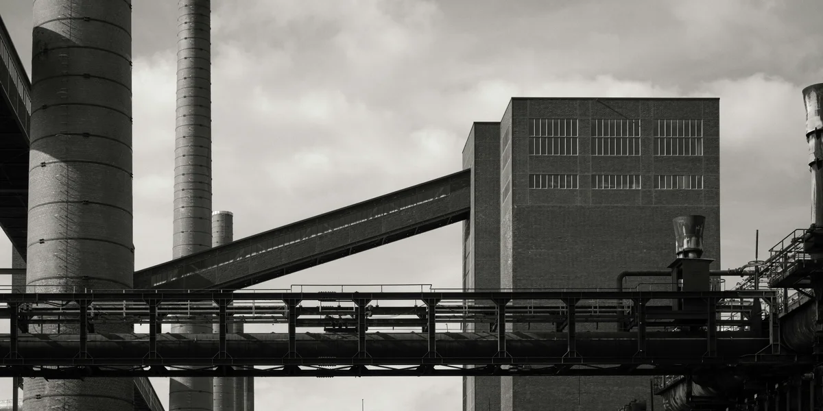 Black-and-white photograph of a factory