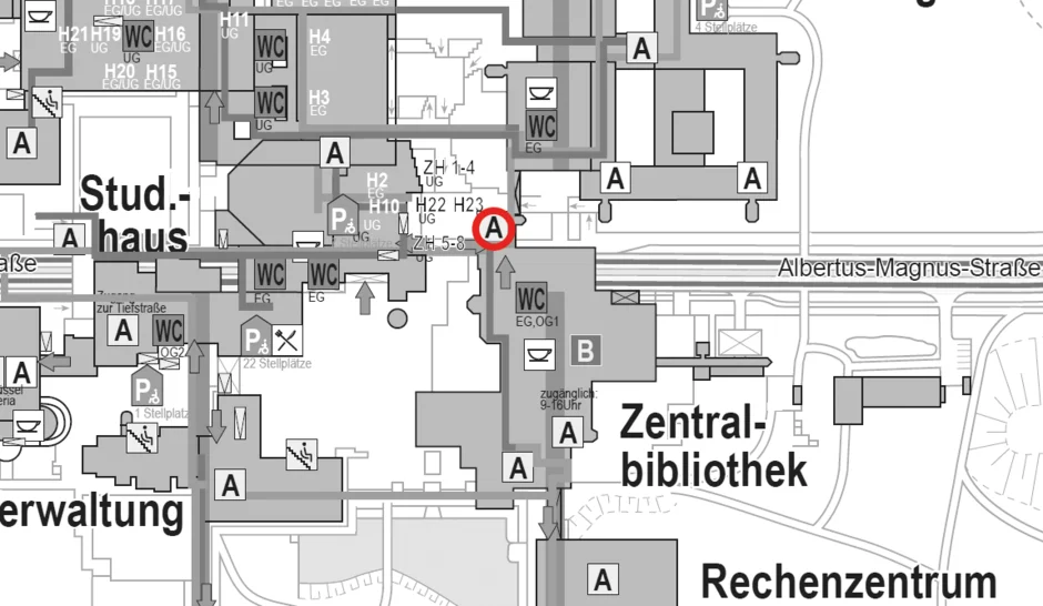 Ausschnitt Campusplan in Graustufen mit mehreren Gebäuden und Wegen. In der Bildmitte ist ein Standort mit einem rot umrandeten Kreis und dem Buchstaben „A“ markiert. 