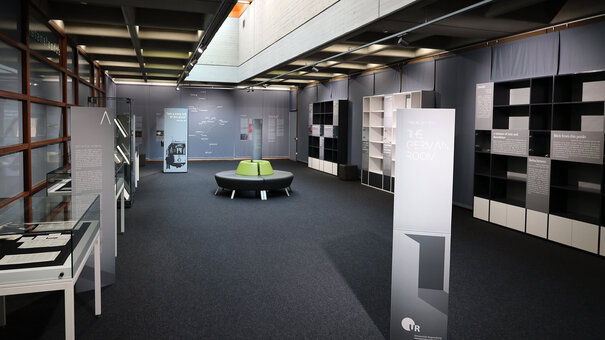 Showroom, display cases, grey walls