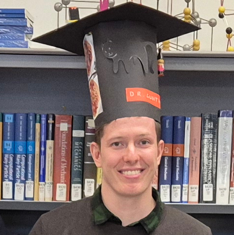 Thomas Naimer with his Ph.D. hat.